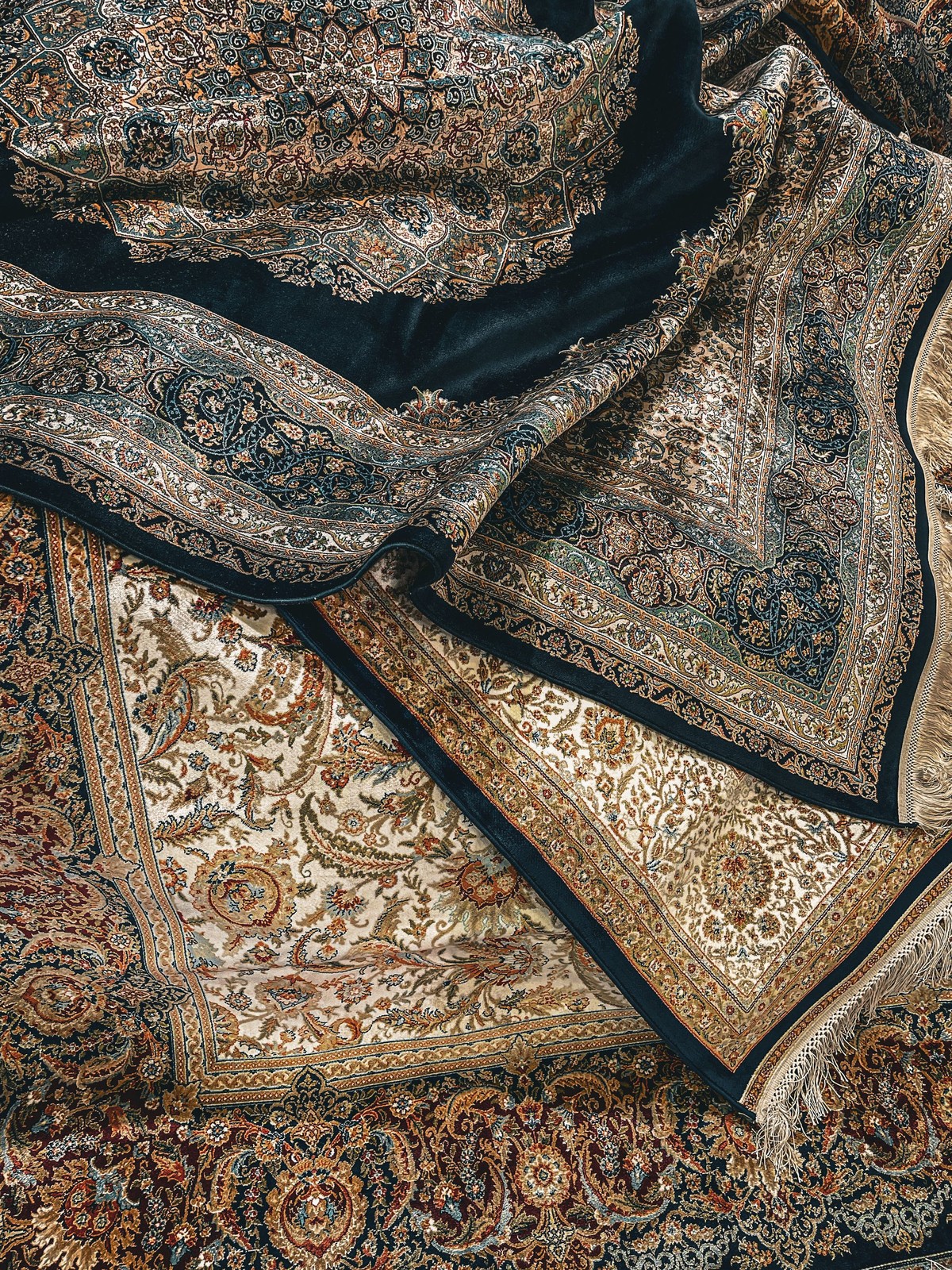 Fine handwoven silk rugs, draped